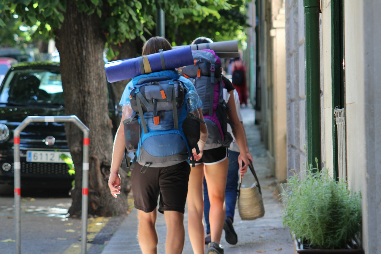 A hiker walking through Sóller in Mallorca