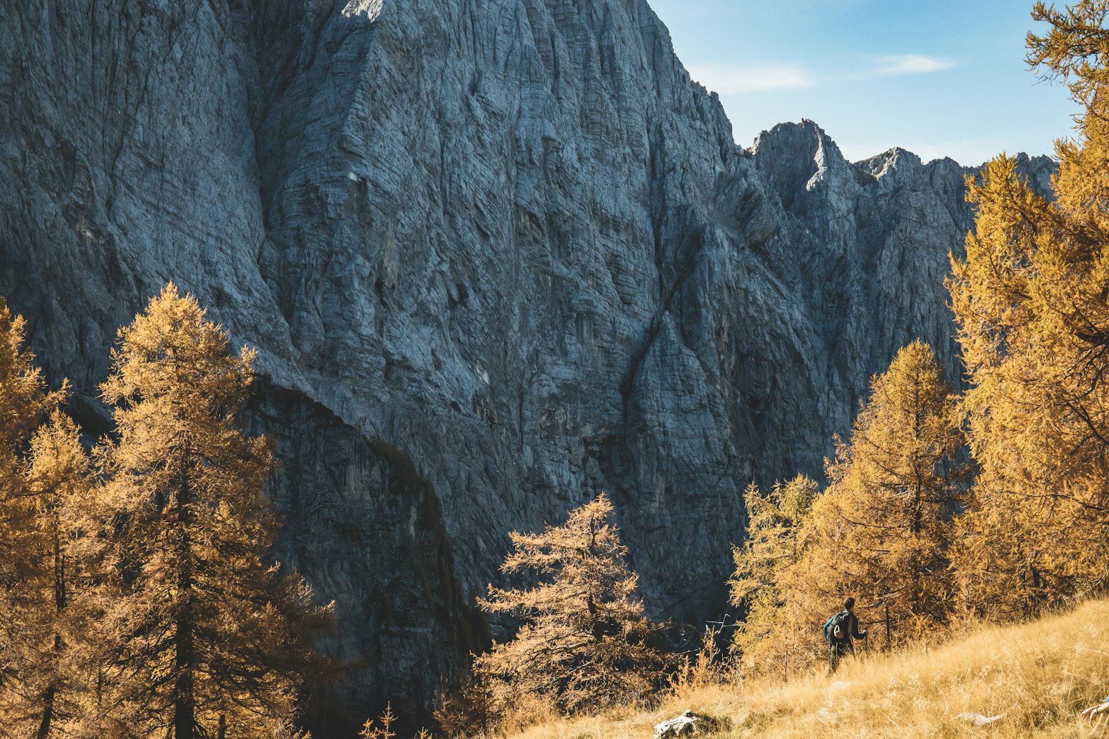 A hiker on a mountain trail in Slovenia